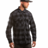 man with flannel shirt grey black gi