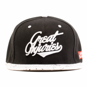 front of black snapback with white peak and white text