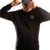 man with grey cap and black positive hoodie