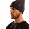 dark grey charcoal beanie with black label on side