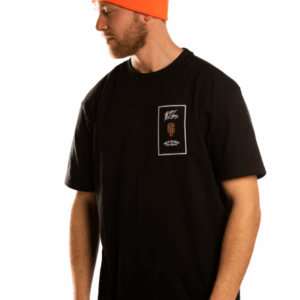 model with ornagen beanie and black great injuries shirt