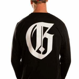 man with black longsleeve and big white g on the back