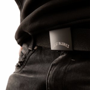 black canvas belt with black buckle and text