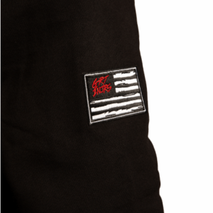 detail of arm patch of flag on a black hoodie