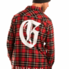 back of red lumberjack shirt with a big white g on it