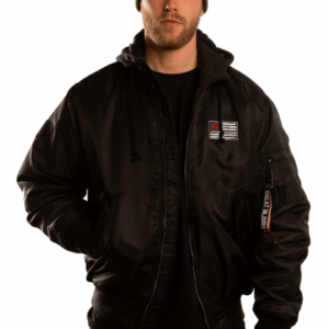 man with hand in pocket of bomber jacket