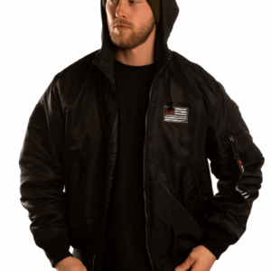 man wearing the trust bomber jacket from great injuries and beanie